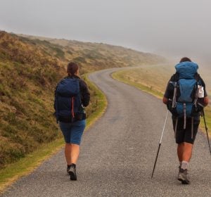 Couple,Of,Pilgrims,Along,The,Camino,De,Santiago.,Path,Of
